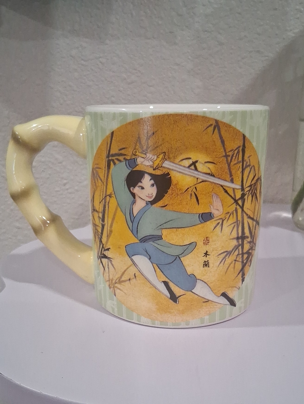 Disney Mulan Ceramic Mug with Yellow Handle and Gold Accent